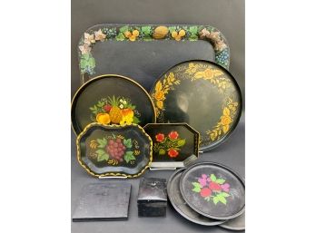A Collection Of Tole-Painted Black Metal Trays