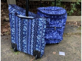 Two Bright-Blue Rolling Travel Bags