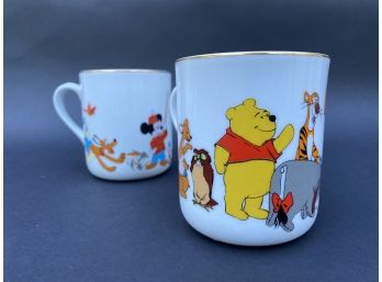 A Vintage Pair Of Disney Mugs