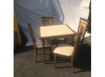 Mid Century Stakmore Cane Back Folding Four Chairs And A Table Set.