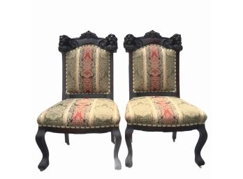 Pair Of Vintage Upholstered Chairs With Carved Lion Heads.