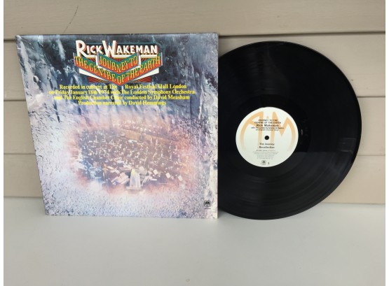 Rick Wakeman. Journey To The Center Of The Earth On 1974 A&M Records. Vinyl Is NM. Jacket Is VG Plus Plus.