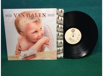 Van Halen. MCMLXXXIV On 1983 Warner Bros. Records. Vinyl Is Pristine Near Mint. Jacket Is Pristine Near Mint.