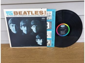The Beatles. Meet The Beatles On 1963 Capitol Records Mono. Vinyl Is Very Good. Jacket Is Very Good Plus.
