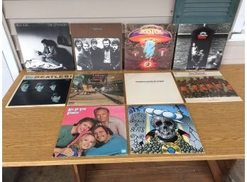 10 Vintage Rock LP Record Albums. Billy Joel, The Band, Boston, John Lennon, The Beatles, Mama Cass.