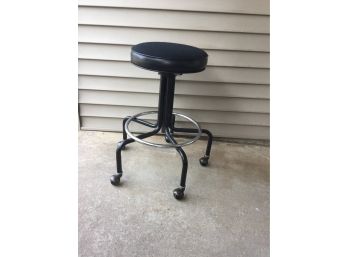 Adjustable Drafting Stool On Wheels With Chrome Foot Rest.