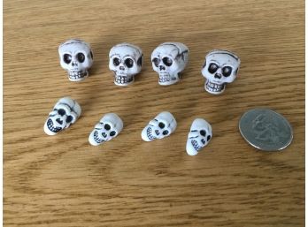 Lot Of Four (4) Skulls And Four (4) Skull Beads.