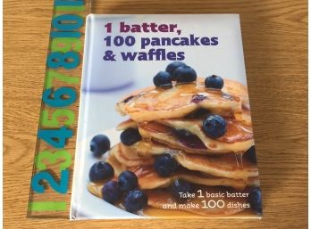 1 Batter. 100 Pancakes & Waffles. 224 Page Beautifully Illustrated Hard Cover Book In Excellent Condition.