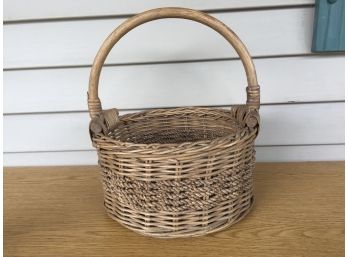 Wonderful Vintage Round Woven Wicker Basket With Heavy Bent Wood Handle.