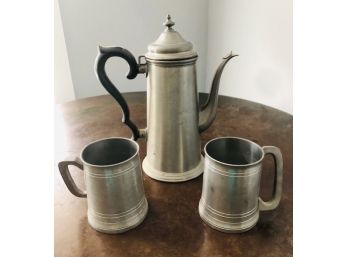 Two Hampshire Pewter Mugs With An International Silver Company Pitcher