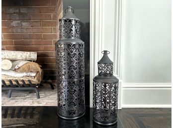 Pair Of Decorative Metal Lanterns With Cutout Fleur De Lis Pattern