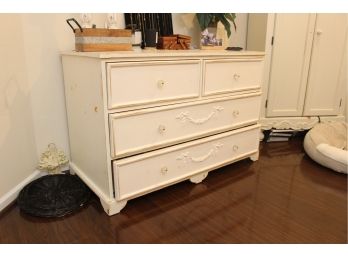 Distressed White Chest With Carved Accents And Clear Glass Pulls