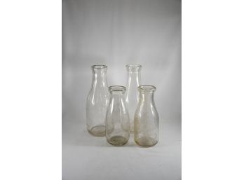 Lot Of 4 Clear Glass Vases/Jugs
