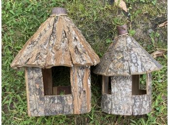 A Pair Of Rustic Bird Houses