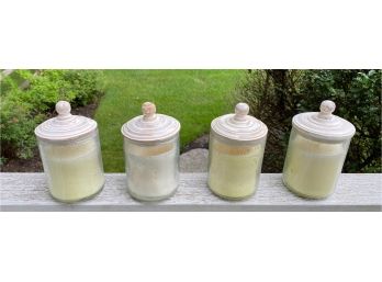 Set Of 4 Candles In Covered Jars