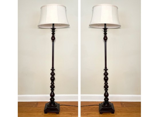 A Pair Of Turned Wood Standing Lamps
