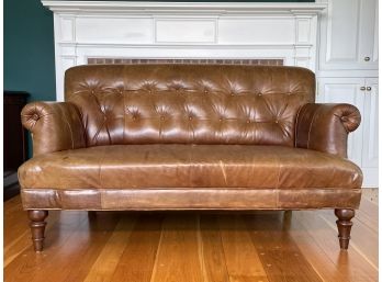 A Vintage Distressed Leather Chesterfield Loveseat