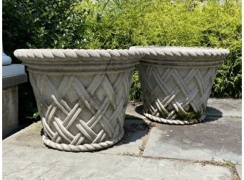A Pair Of Cast Stone Outdoor Planters