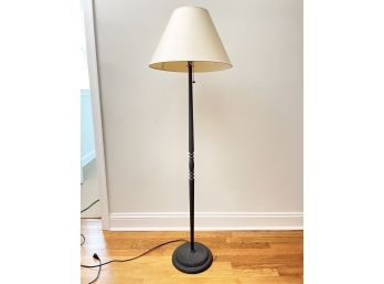 A Wrought Iron Standing Lamp