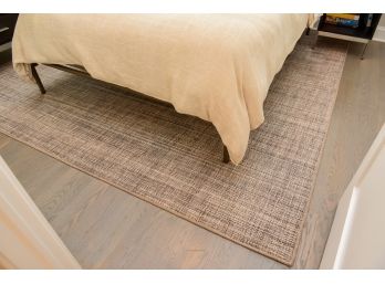 Neutral Toned Area Rug With Padding