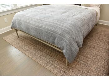 Neutral Toned Area Rug With Padding