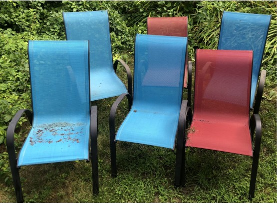 Four Blue, Two Red Outdoor Chairs
