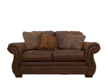 Ashley Furniture - Poly/Down Loveseat With Rolled Arms And Nailhead Finishes & 2 Accent Pillows