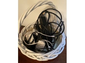 Basket Of Wires, Chargers, And Headphones