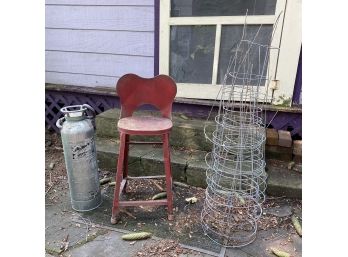 Metal Stool, Antique Fire Extinguisher, And Tomato Cages