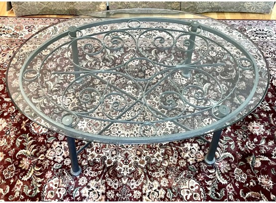 Decorative Wrought Iron Coffee Table Topped With Oval Glass