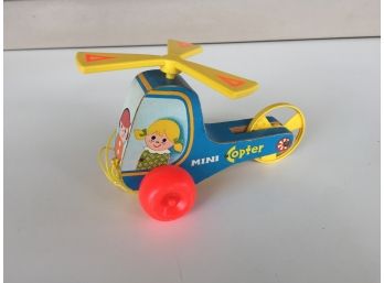 Vintage Fisher Price No. 448 Mini Copter Pull Toy.