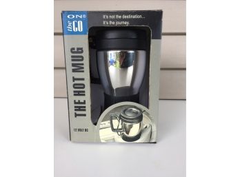 Brand New. The Hot Mug. 12 Volt DC.  Keep Your Coffee Or Drink Hot Wherever You Go!