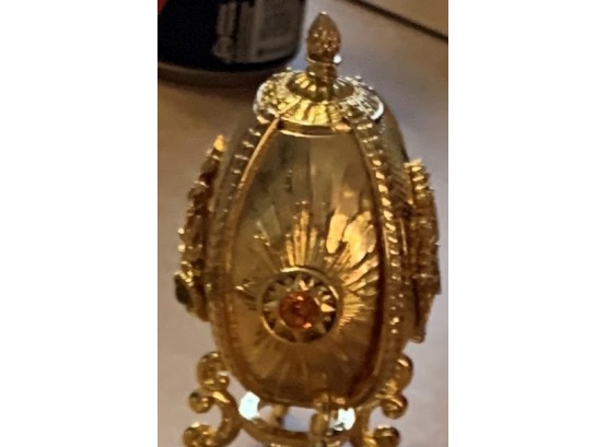 Classic Egg Shaped Gold Colored  Piece