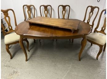 Ethan Allen Dining  Table With Six Chairs And 2 Leaves