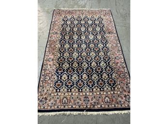 A Vintage Hand Knotted Wool Rug Blue  And Pink 74' X 48'