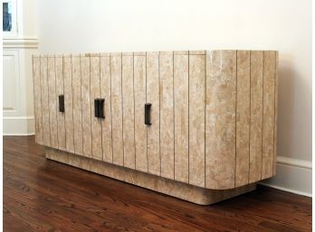 A Vintage Mackintosh-inspired Marble Tile Buffet Accented With Linear Brass Detail By Casa Bique