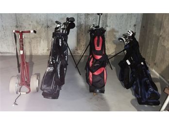 Golf Bags, Clubs And A Pull Cart