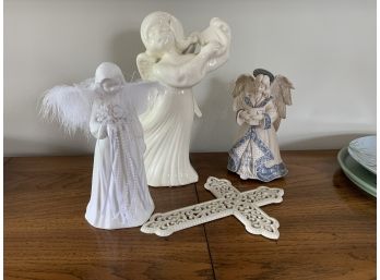 Group Of Angel Figurines And A Cross