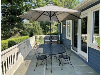 Wrought Iron Outdoor Patio Set With Oval Table, Four Chairs & Umbrella