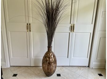 Copper Colored Glass Thumbprint Design Floor Vase With Striped Reeds
