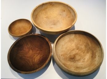 Group Of Four Vintage Worn Wooden Bowls