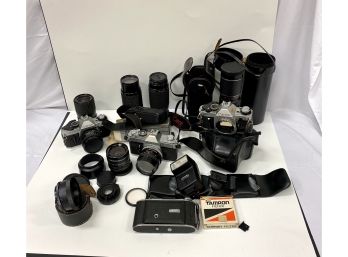 Collection Vintage Cameras,  Lenses And Camera Accessories Including Canon AE-1 And FTb