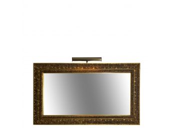 High Relief Gilt Framed Beveled Mirror With Brass Gallery Light