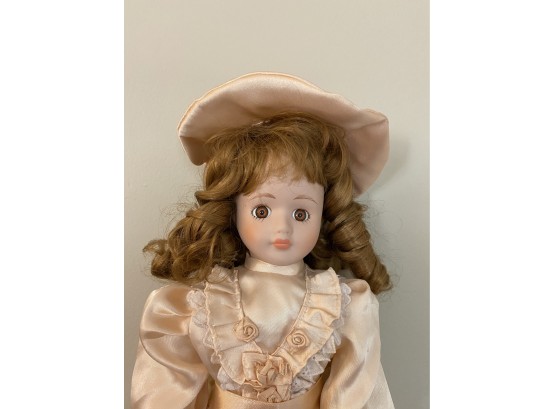 Curly Brown Hair And Pink Satin Frock With Hat