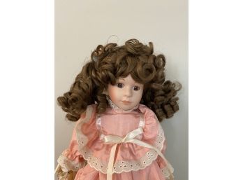 Baby Doll With Big Brown Curls Pink Lace Dress