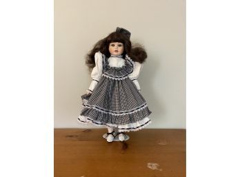 Numbered Doll With Black Plaid Dress And Brown Hair