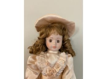 Curly Brown Hair And Pink Satin Frock With Hat