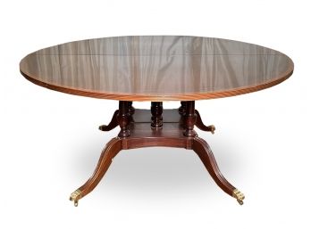 A Bespoke Banded Mahogany Dining Table By Handcrafted Furniture, Includes 2 Leaves, Pads, And Carrier