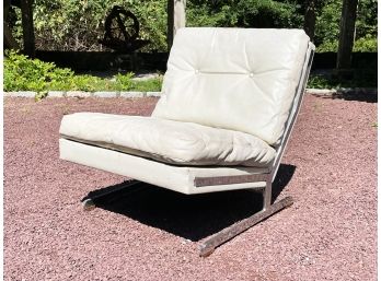 A Vintage Modern Leather And Chrome Chair In Barcelona Chair Style (AS IS)
