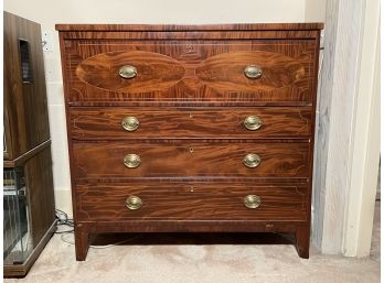 A 19th Century Federal Chest Of Drawers In Veneered Tiger Maple
